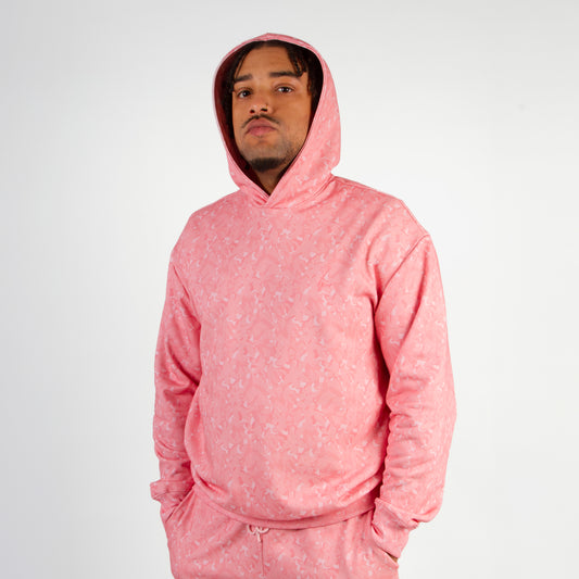 lucewear: homme portant un hoodie à capuche rose